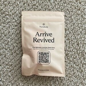 Therabody Arrive Revived Wellness Pack Towelette Lip Balm Hair Cream